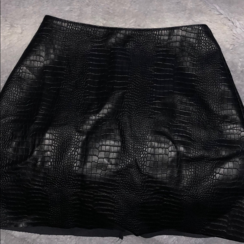 Faux snake skin leather skirt.